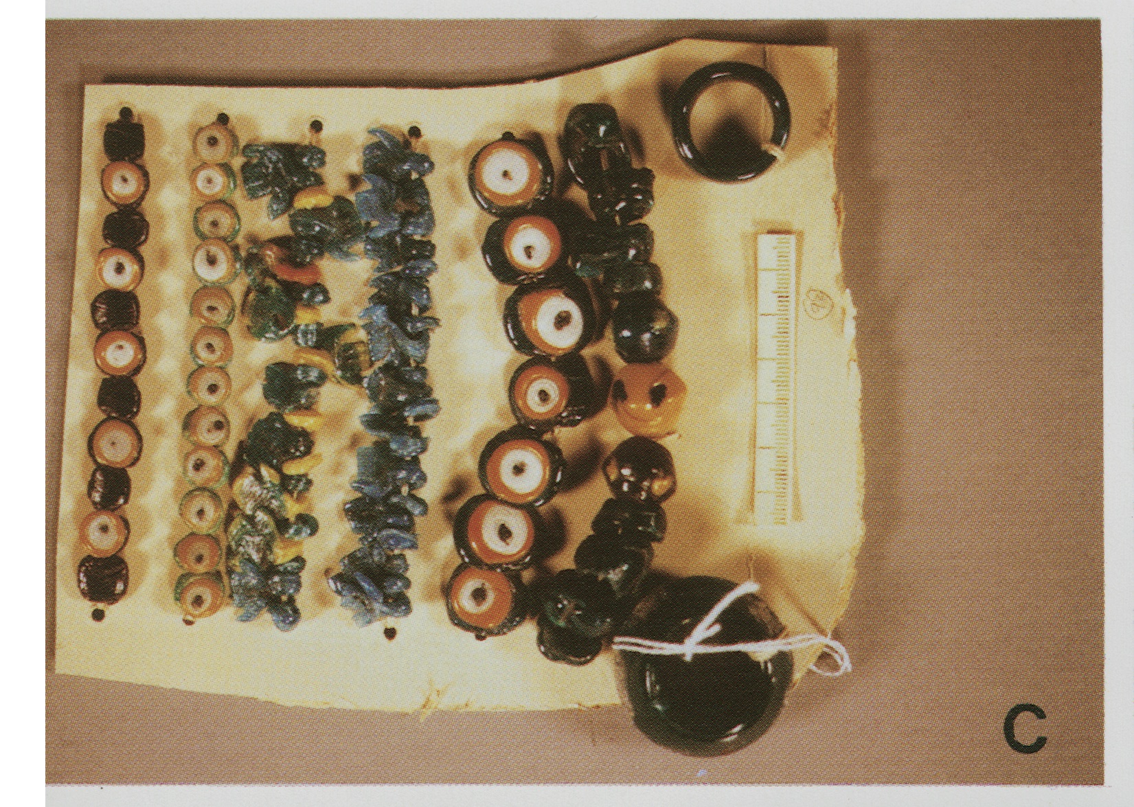 Plate VC Islamic Beadmaking: Beads made in Hebron early in the 20th century. This card was collected in the 1920s. Note that both the 