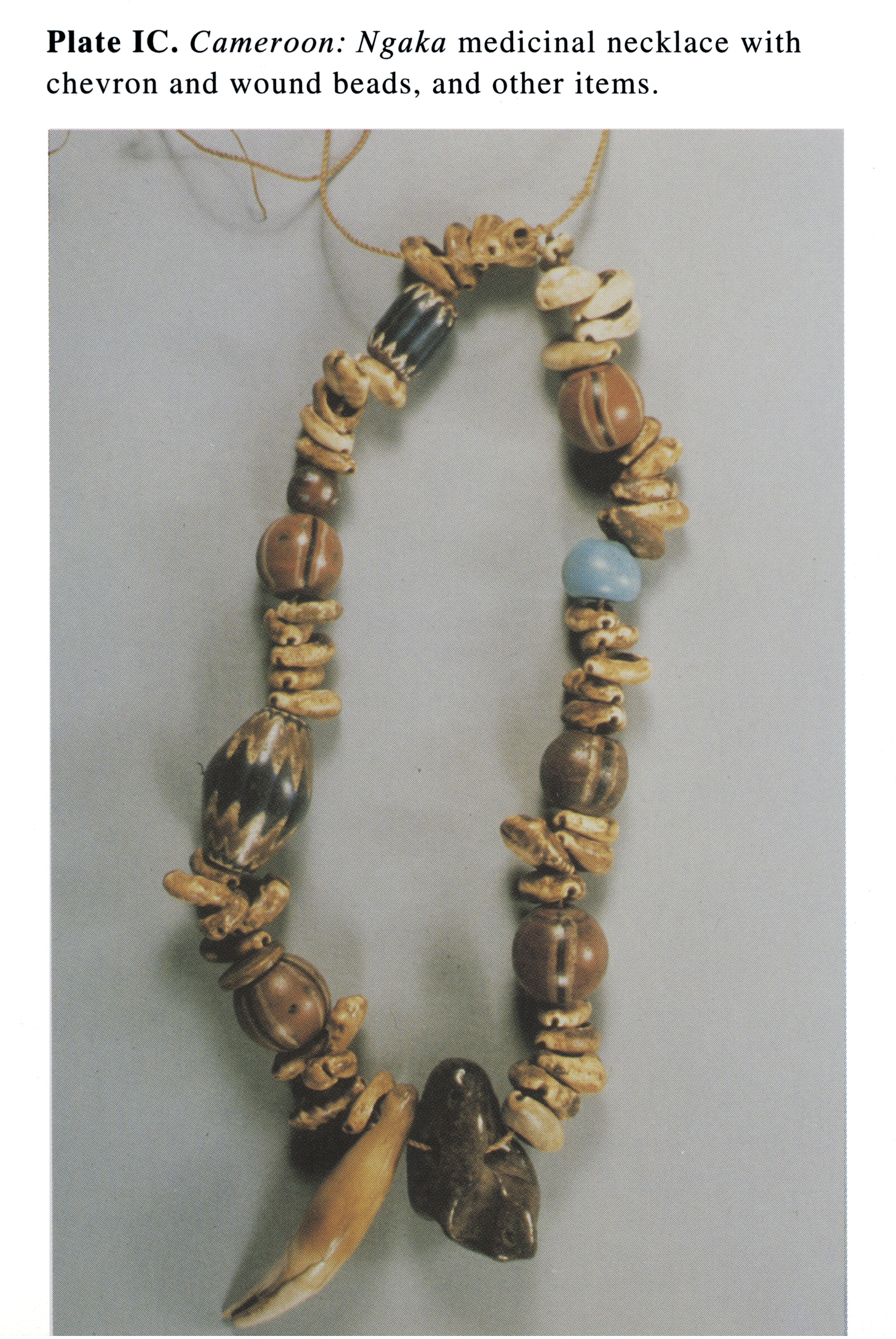 Plate IC Cameroon: Ngaka medicinal necklace with chevron and wound beads, and other items.