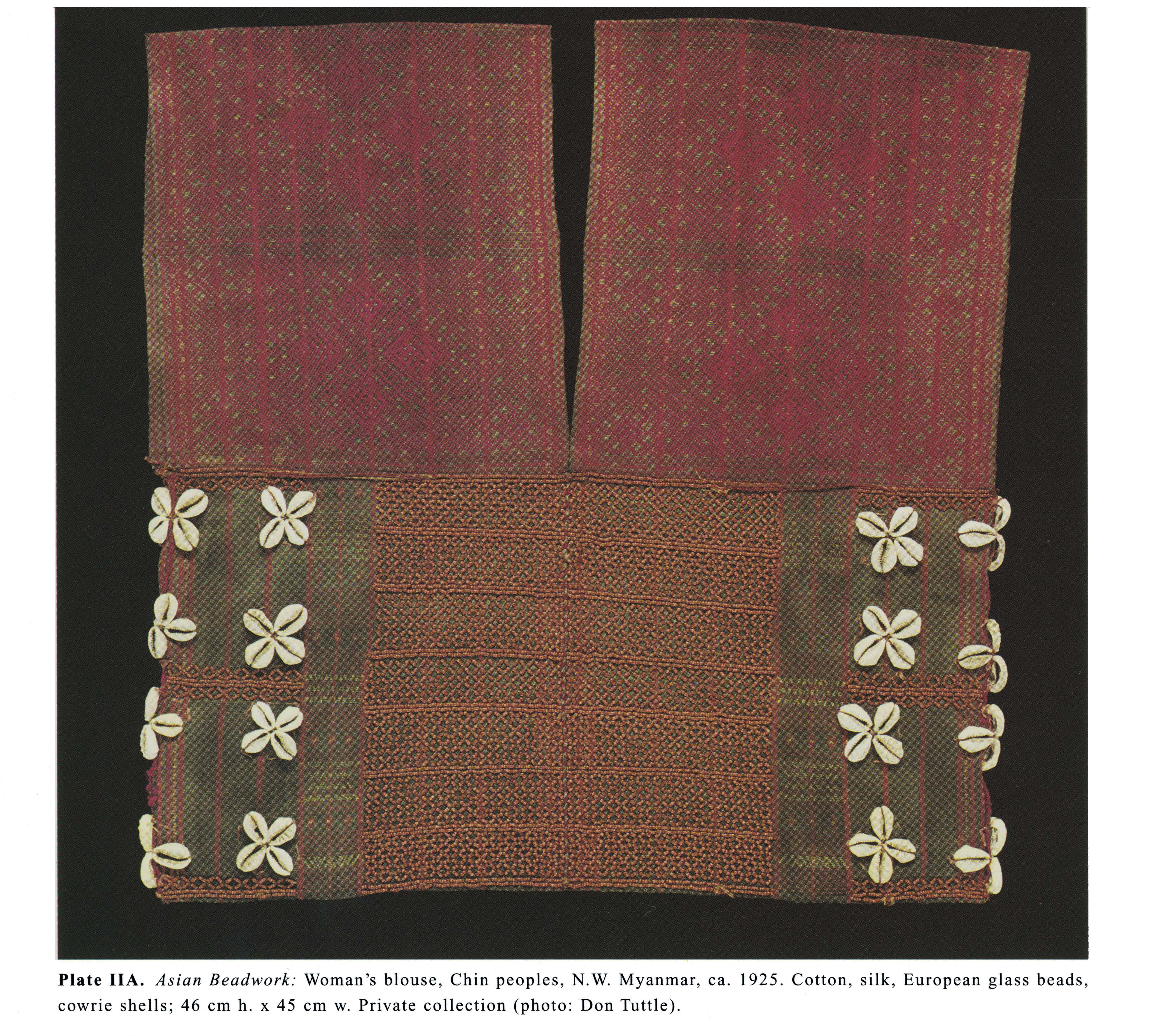 Plate IIA Asian Beadwork: Woman's blouse, Chin peoples, N.W. Myanmar, ca. 1925. Cotton, silk, European glass beads, cowrie shells; 46 cm h. x 45 cm w. Private collection (photo: Don Tuttle).