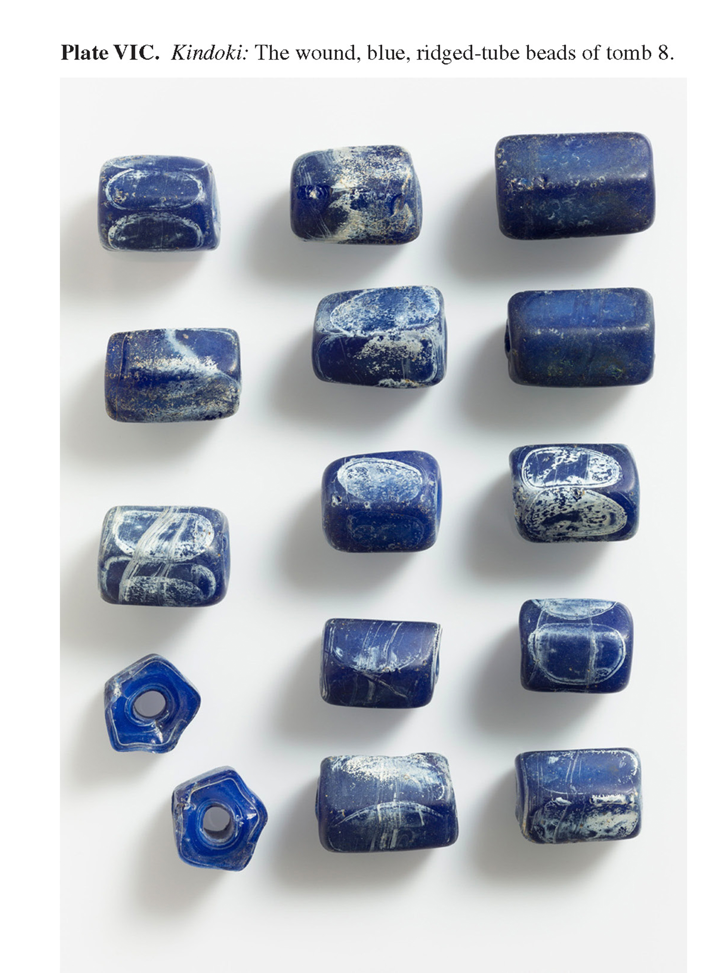 Plate VIC Kindoki: The wound, blue, ridged-tube beads of tomb 8.