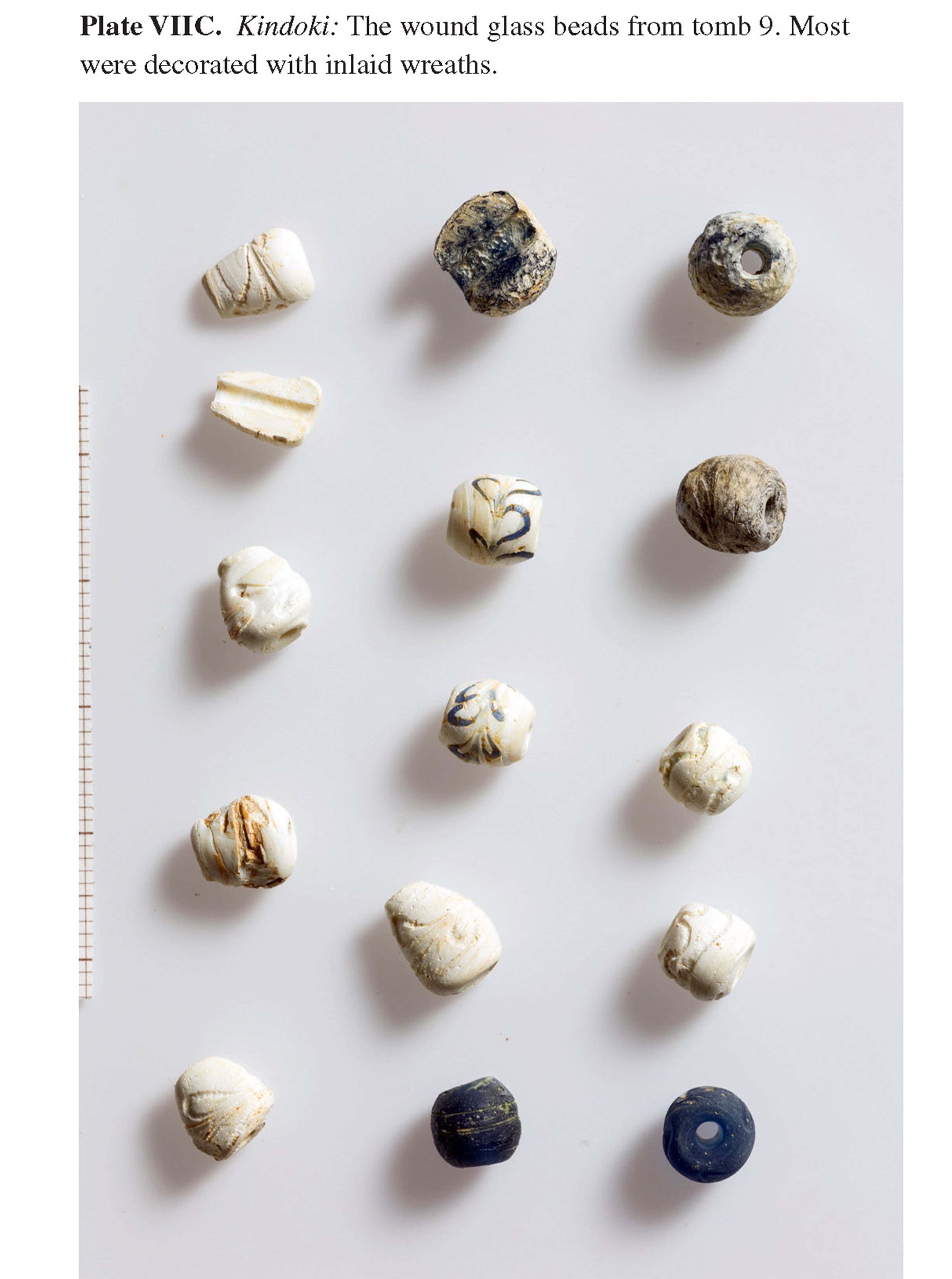 Plate VIIC Kindoki: The wound glass beads from tomb 9. Most were decorated with inlaid wreaths.