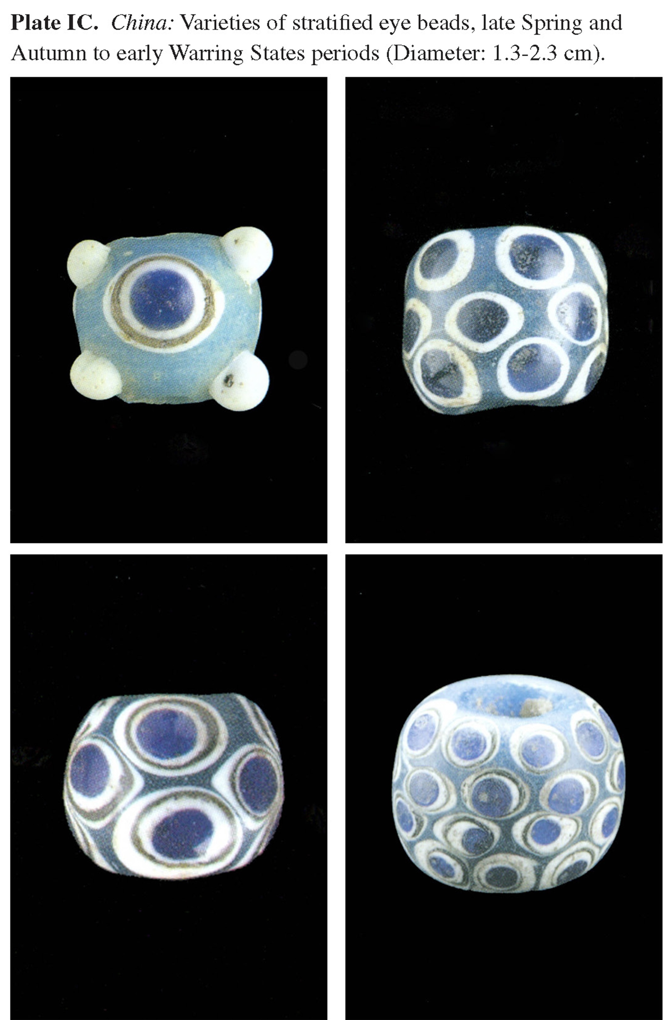 Plate IC China: Varieties of stratified eye beads, late Spring and Autumn to early Warring States periods (Diameter: 1.3-2.3 cm).