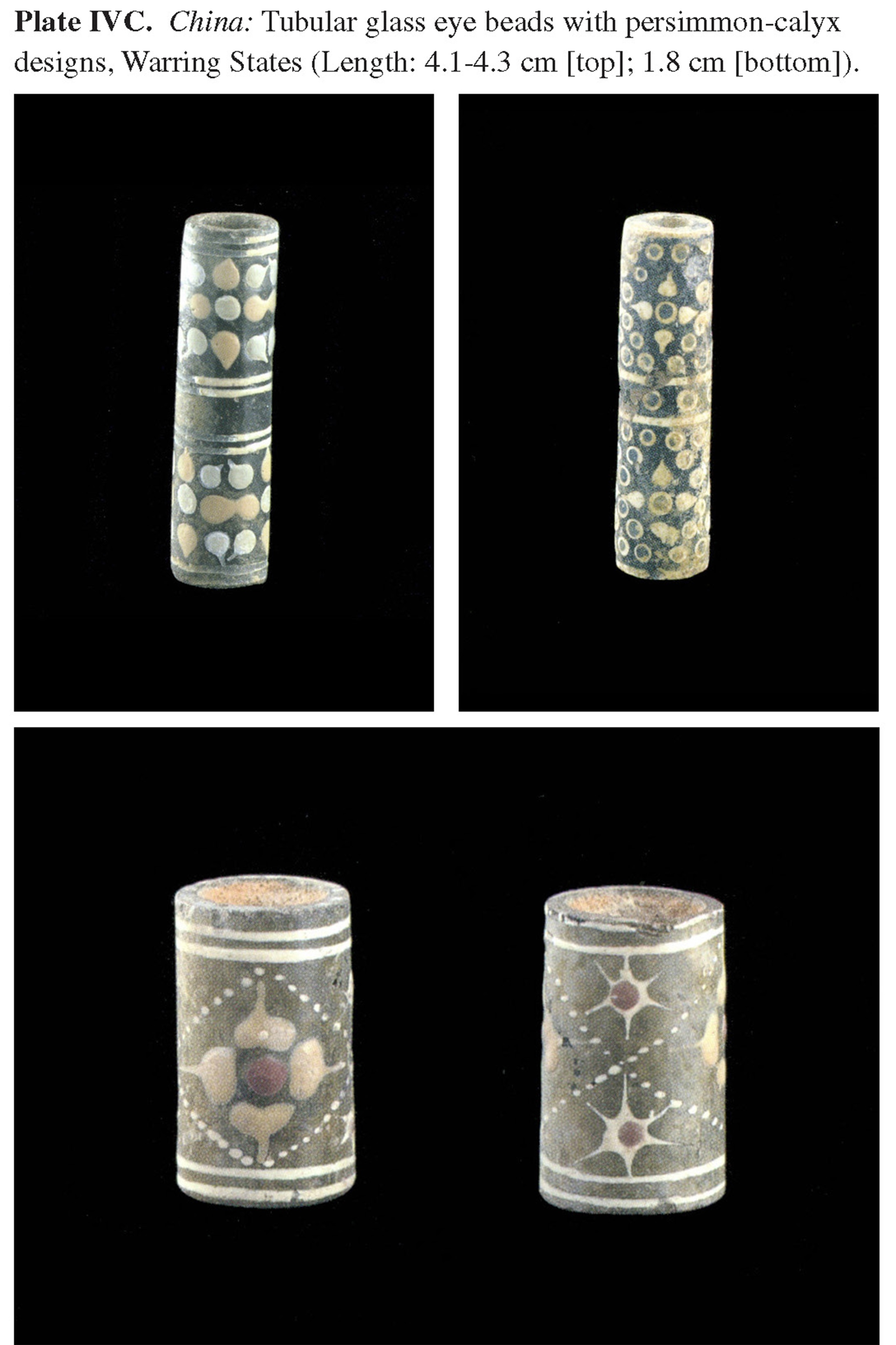 Plate IVC China: Tubular glass eye beads with persimmon-calyx designs, Warring States (Length: 4.1-4.3 cm [top]; 1.8 cm [bottom]).