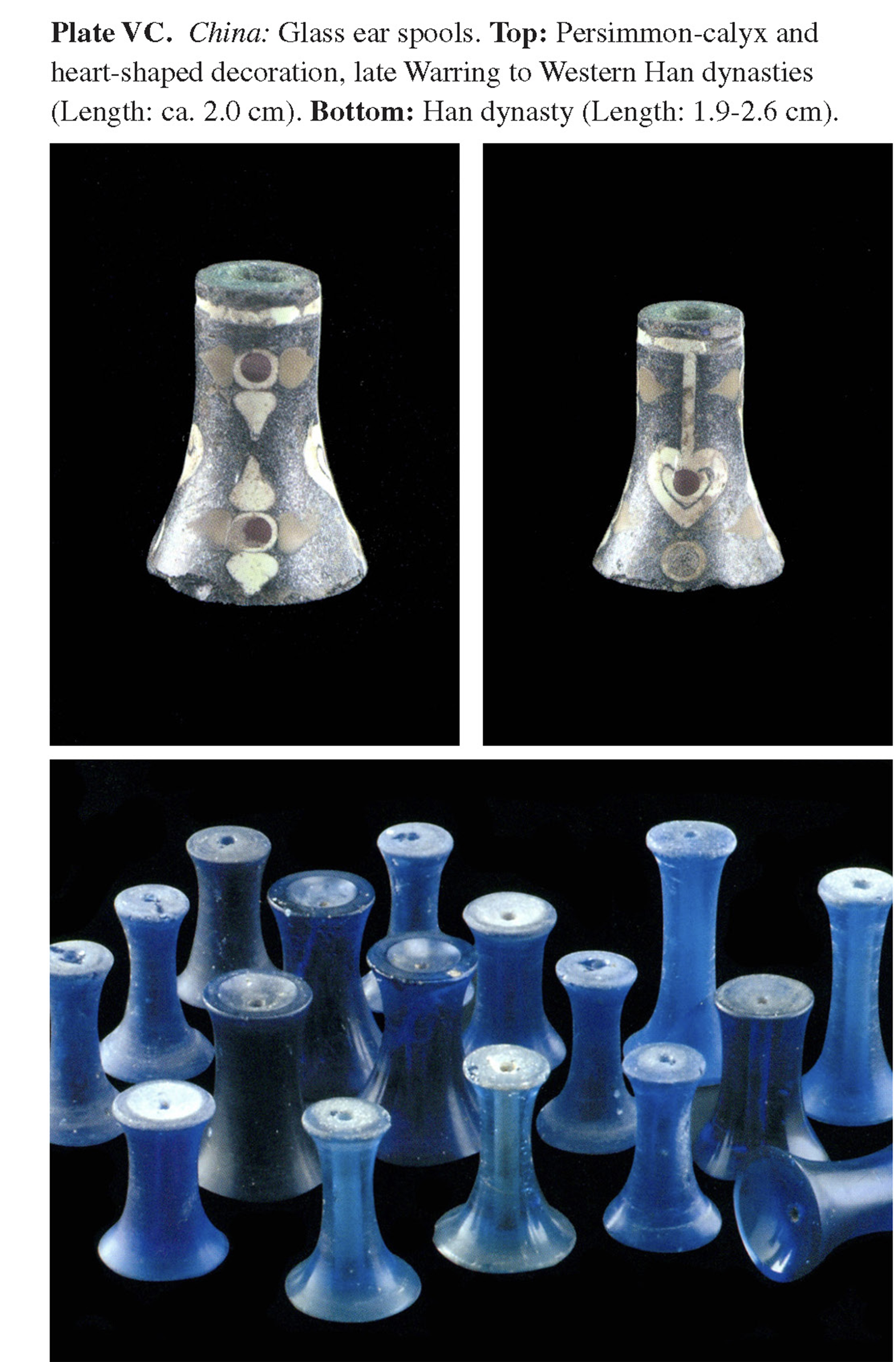 Plate VC China: Glass ear spools. Top: Persimmon-calyx and heart-shaped decoration, late Warring to Western Han dynasties (Length: ca. 2.0 cm). Bottom: Han dynasty (Length: 1.9-2.6 cm).