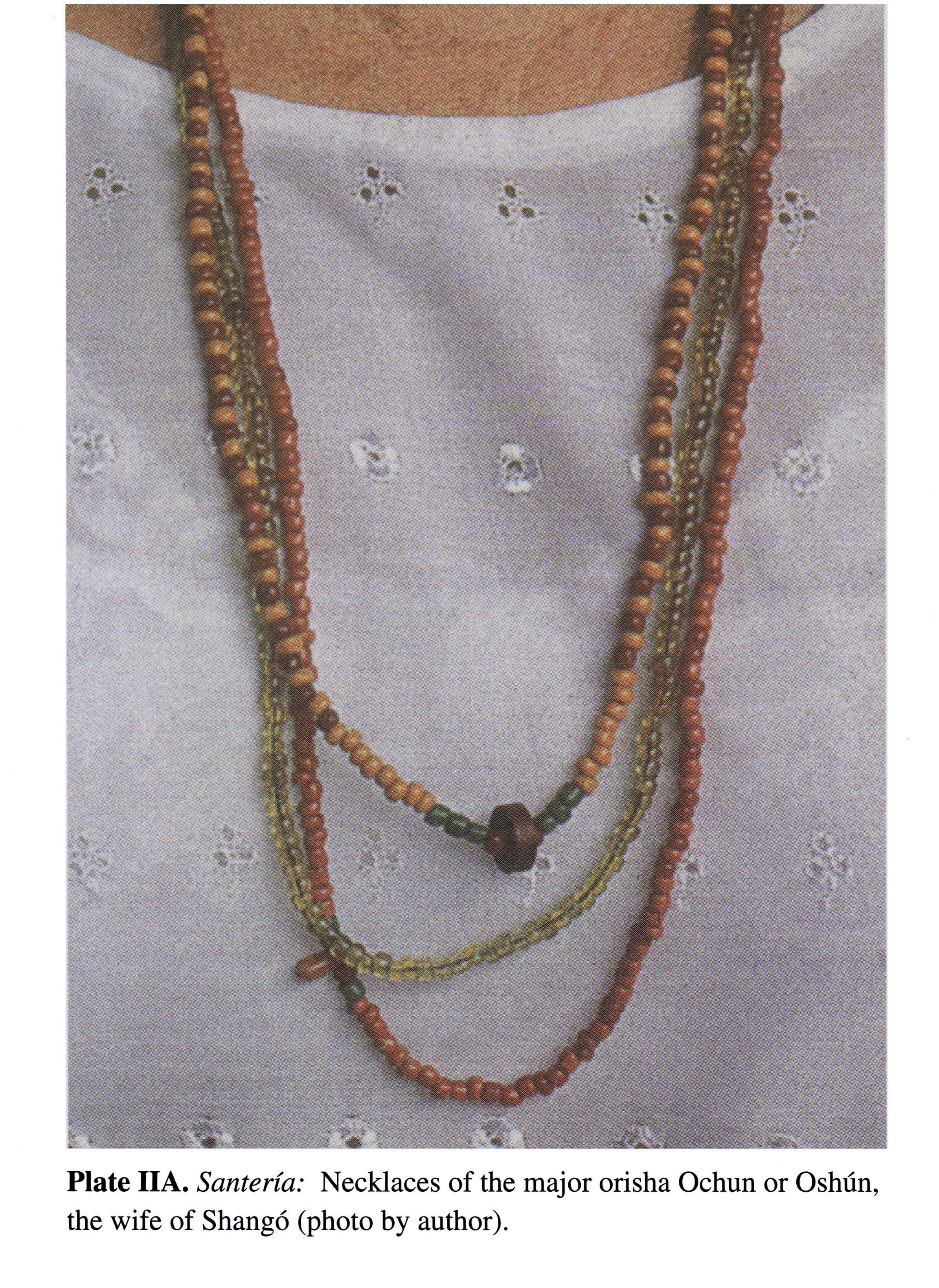 Plate IIA Santería: Necklaces of the major orisha Ochun or Oshun, the wife of Shangó (photo by author).