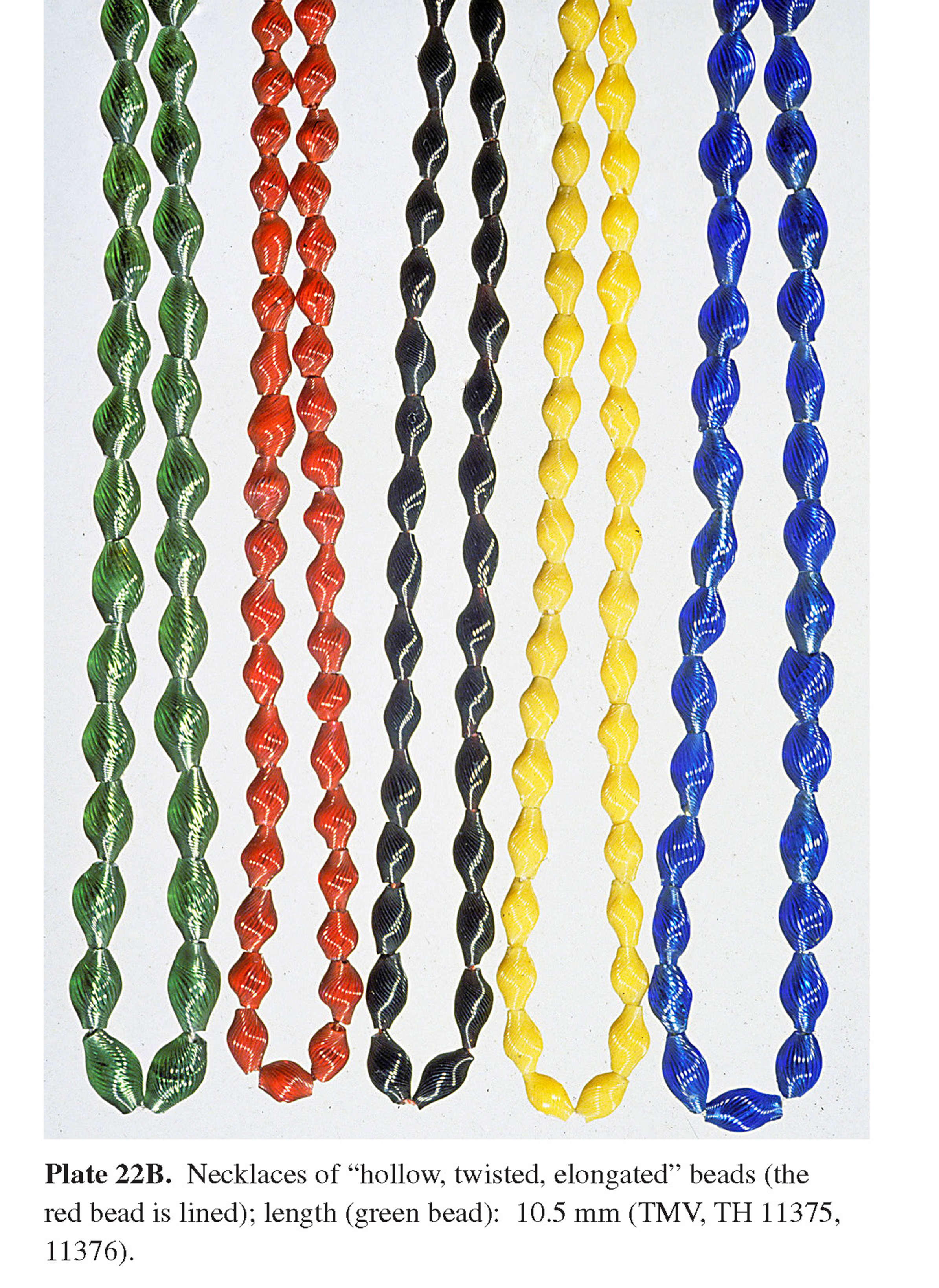 Plate 22B Necklaces of “hollow, twisted, elongated” beads (the red bead is lined); length (green bead): 10.5 mm (TMV, TH 11375, 11376).